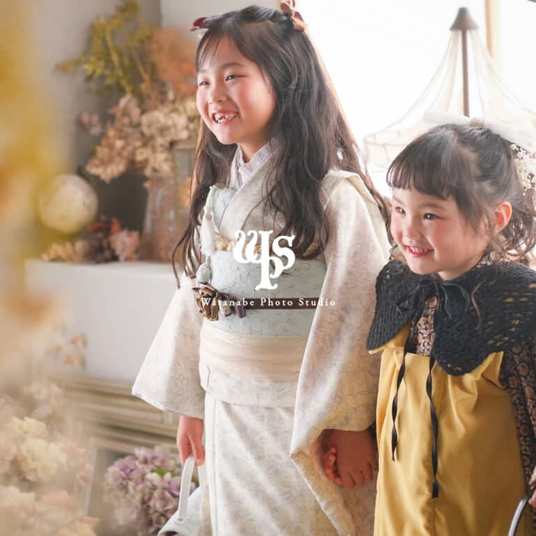 two girls in white dresses