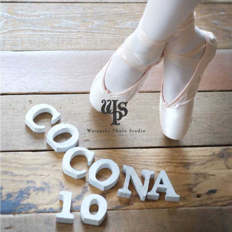 a person's feet in ballet shoes