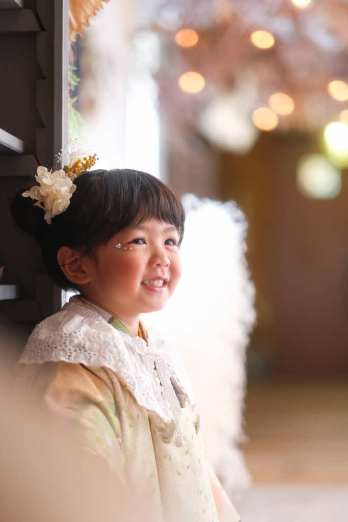 a girl smiling at the camera